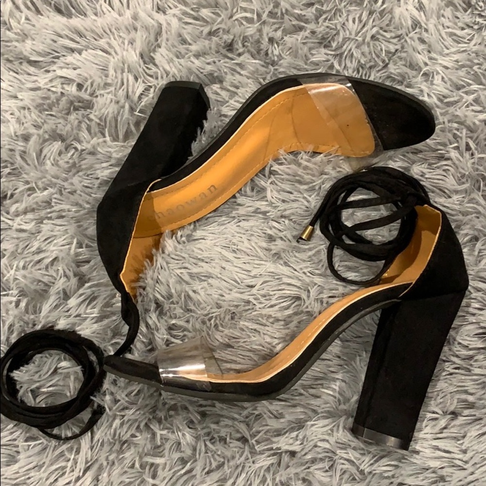 Black strap oh heels with a clear strap